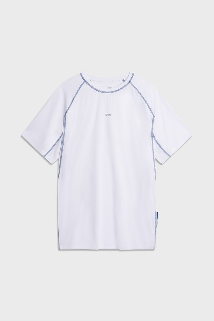 The white TIOTIO Performance Tee photographed flat, front